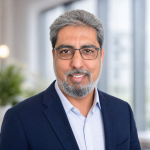 A close-up portrait of Instructor Haroon Mansoori